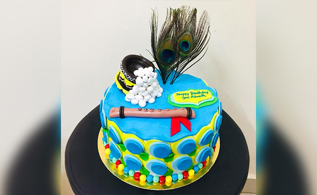 Peacock Feather & Flute Krishna Cake