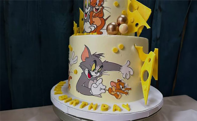 Cartoon-Themed Pineapple Cake for Kids