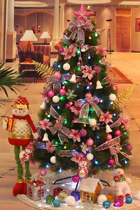 A Christmas tree strictly decorated for kids at home