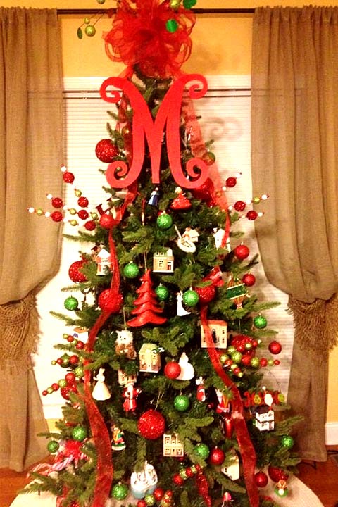 A Christmas tree of monogram style a sparkly letter at the top of the tree