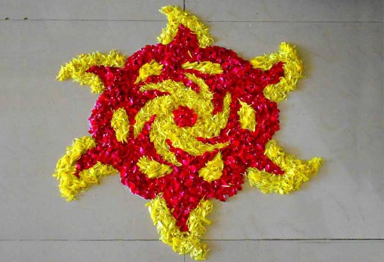 Rangoli design with Red and Yellow Flowers Rangoli design with Red and Yellow Flowers
