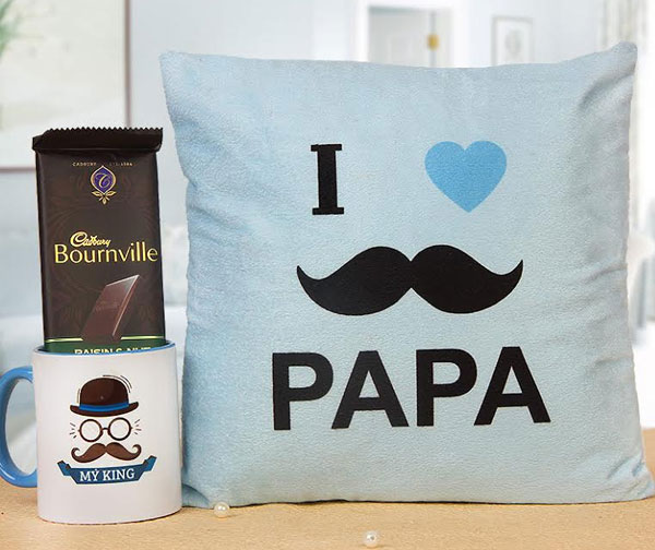 Combo of snug cushion, coffee mug & chocolate as Father's Day gift