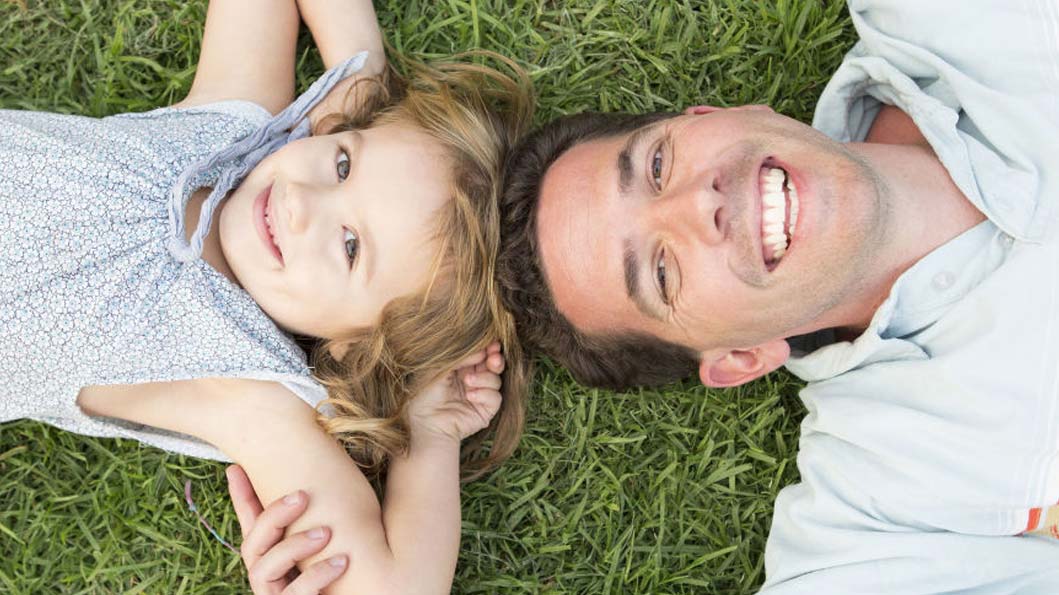 Daughter seeing through her fathers eye all the dreams of success Daughter seeing through her fathers eye all the dreams of success