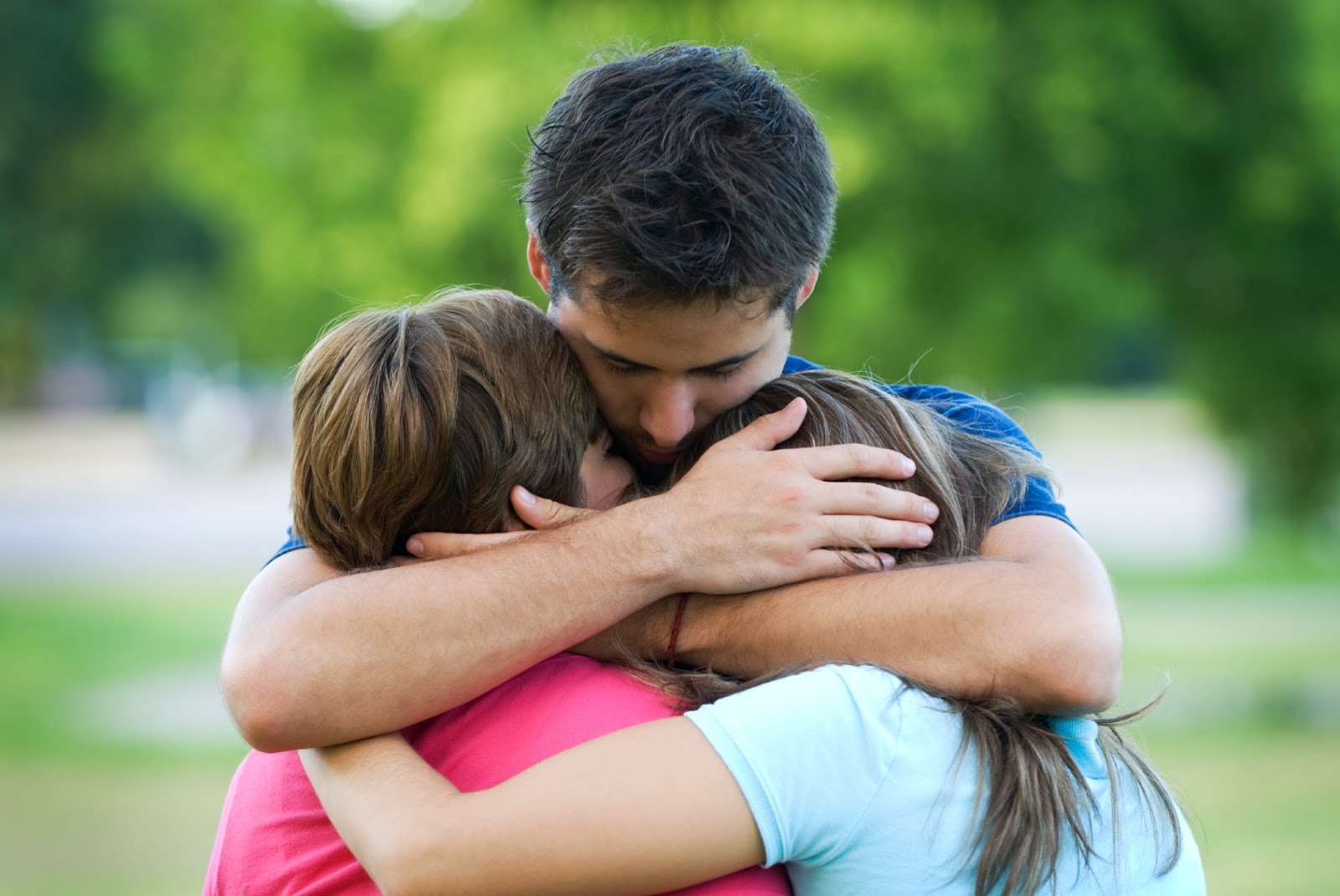 Father hugging her daughter when she is little upset Father hugging her daughter when she is little upset