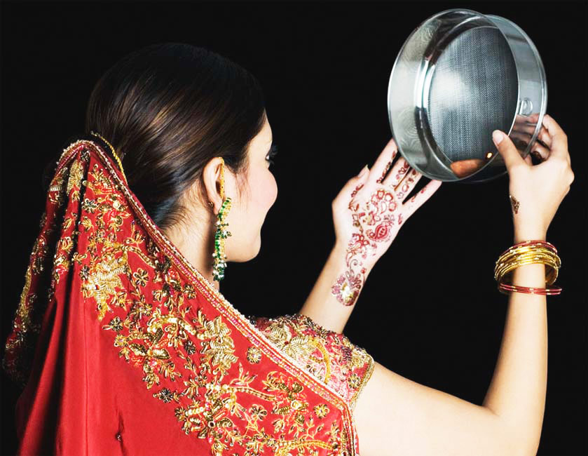 - A Wife smiling and seeing the moon A ritual of karwa chauth - A Wife smiling and seeing the moon A ritual of karwa chauth