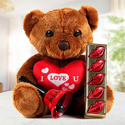 A Brown Teddy With An “I Love You” Heart And Romantic Lip-Shaped Dark Chocolates A Brown Teddy With An “I Love You” Heart And Romantic Lip-Shaped Dark Chocolates