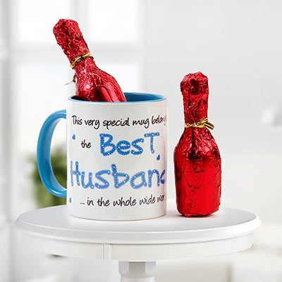 A Combo Of Chocolate And Ceramic Mug On Which Best Husband Is Printed A Combo Of Chocolate And Ceramic Mug On Which Best Husband Is Printed