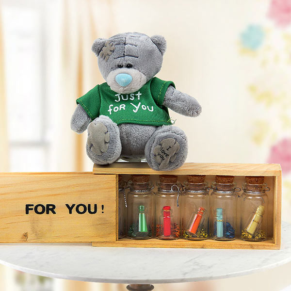 A combo of beautiful teddy and 5 letters in bottles A combo of beautiful teddy and 5 letters in bottles