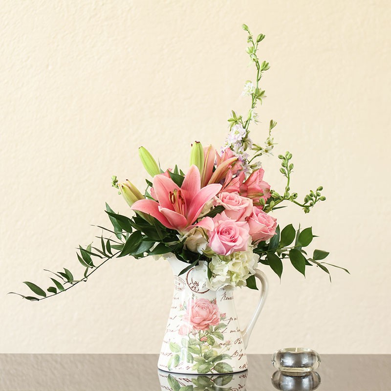 Beautiful flowers in a water jug Beautiful flowers in a water jug