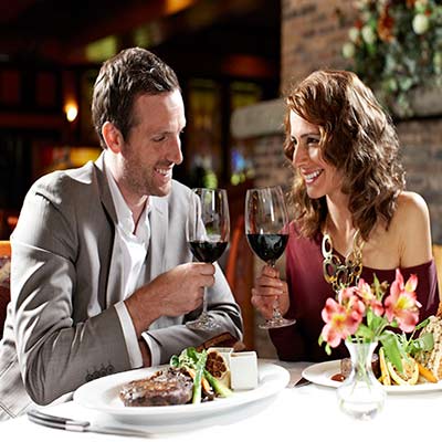 Happy couple doing dinner together